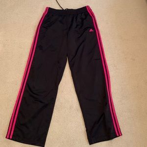 Black Adidas sweatpants with pink stripes on the side. Lightweight material.